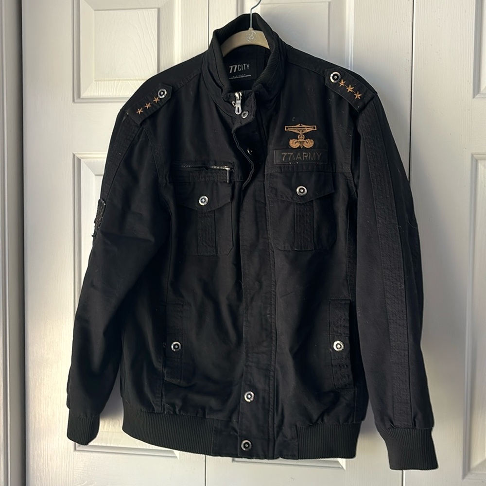 Men’s Bomber jacket size L. Cozy. Good condition. Black with copper colored trim